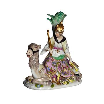 Ceramic sculpture of a women on a camel, WA1967.28.100 Small ceramic sculpture of a women seated on a camel