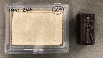 Old Babylonian cylinder seal depicting Ishtar with arrows and a male figure with mace and sword, c.1900-1600 BCE AN1910_246_cylinder seal
