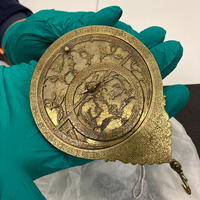 Krasis Scholar holding an astrolabe at the History of Science Museum Krasis Scholar holding an astrolabe at the History of Science Museum