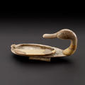Wooden model of a duck with a storage compartment