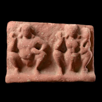 Mottled red sandstone relief plaque with Panchika and Hariti, 2–3 CE, Northern India EAOS.32 Red sandstone relief plaque with three figures